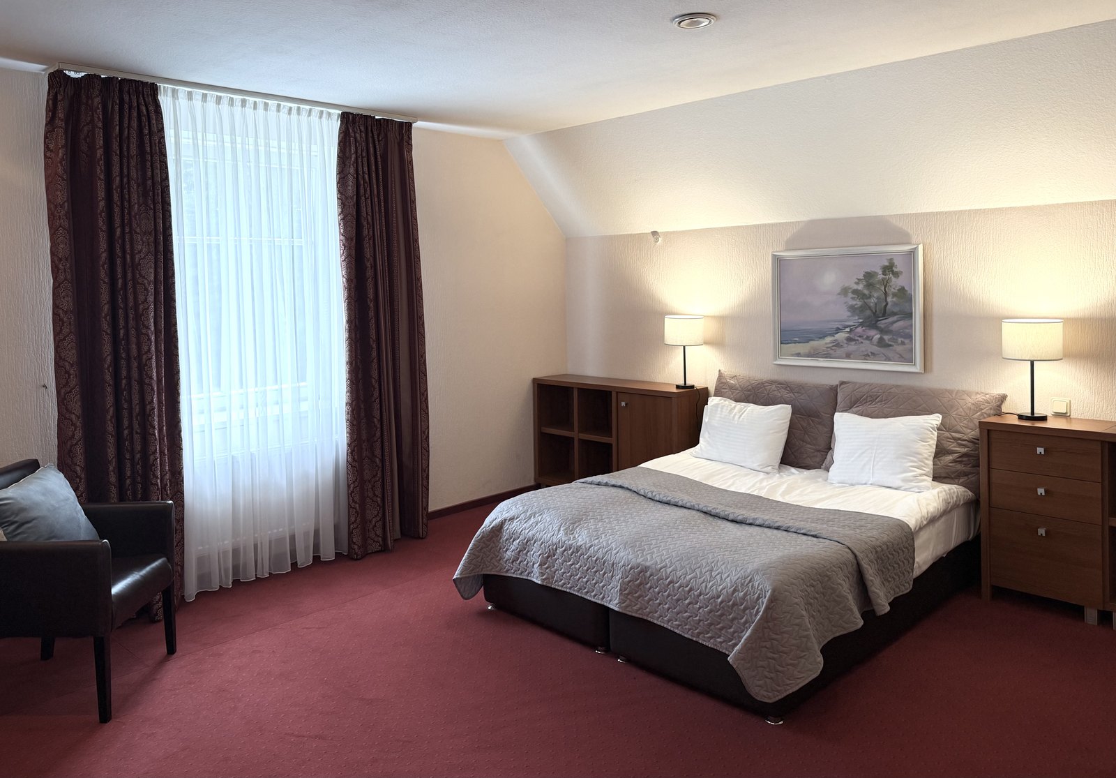 Two-Bedroom Suite living room with calm seating at Lucky Fish Jūrmala